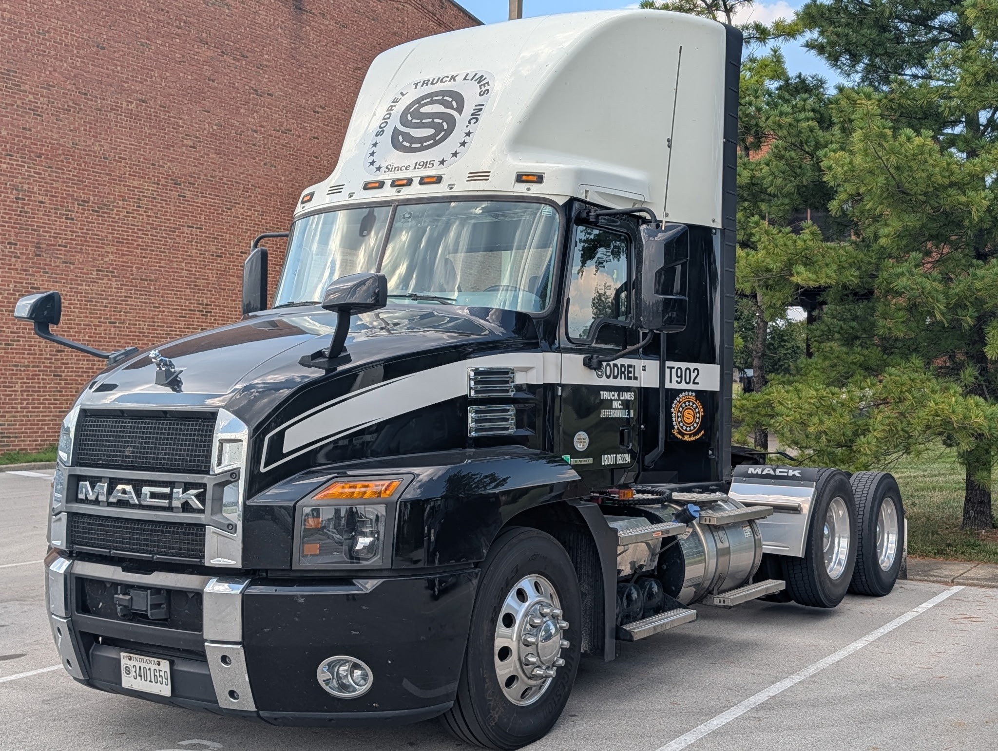 Day cab tractor parked in lot